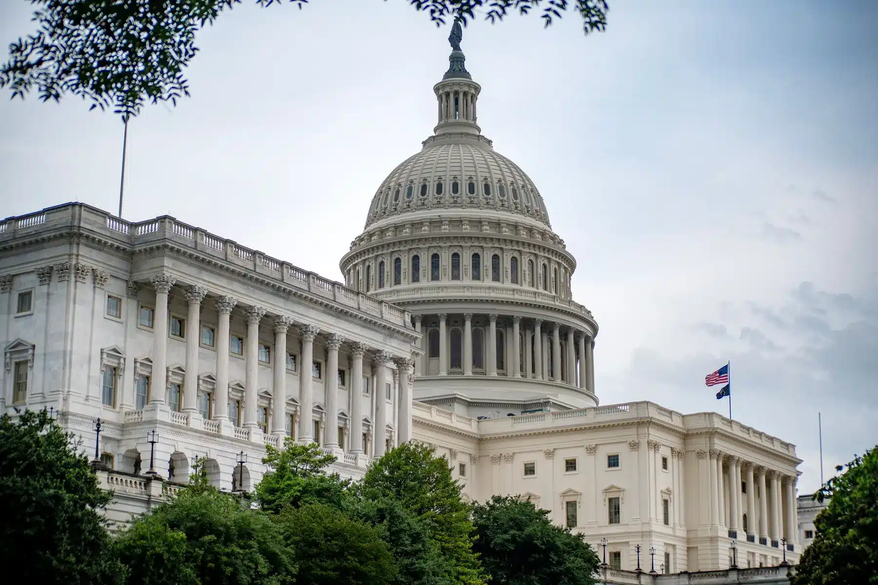 The United States Capitol building in Washington, D.C. with its white dome and classical architecture.
